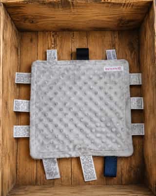 Doudou étiquettes sensorielles